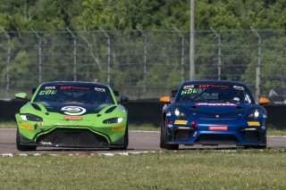 #69 Aston Martin Vantage AMR GT4 of Todd Coleman, Archangel Motorsports, GT America Powered by AWS, GT4, #099 Porsche 718 Cayman GT4 RS Clubsport of Robb Holland, Rotek Racing, SRO America, NOLA Motorsports Park, New Orleans, LA, April 2023.
 | Brian Cleary/SRO