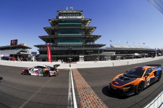 #32 Porsche 911 GT3-R (991.ii) of Kyle Washington, GMG Racing, GT America, SRO3, #085 McLaren Arturo GT4 of Alan Teo, Orlando Motorsports Services, GT4, SRO America, Indianapolis Motor Speedway, Indianapolis, IN, October 2024.
 | Brian Cleary/SRO